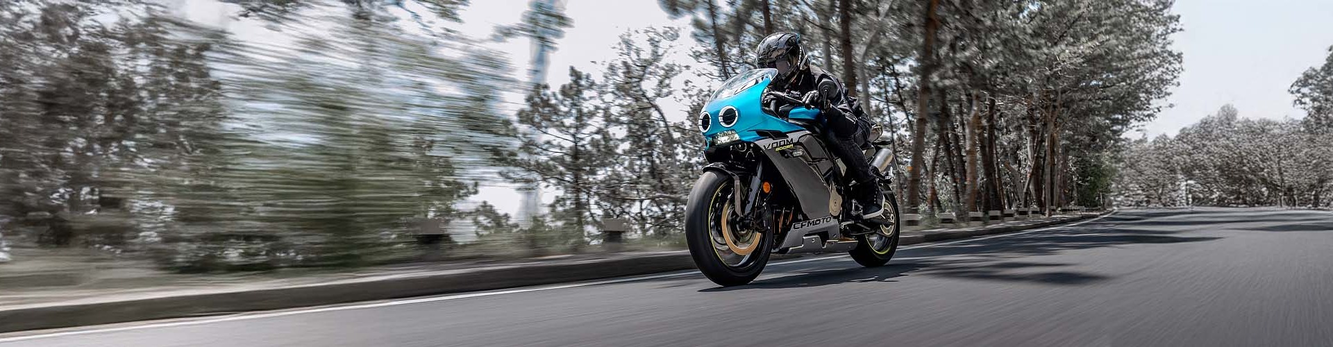 CFMoto Motorcycle riding on the road
