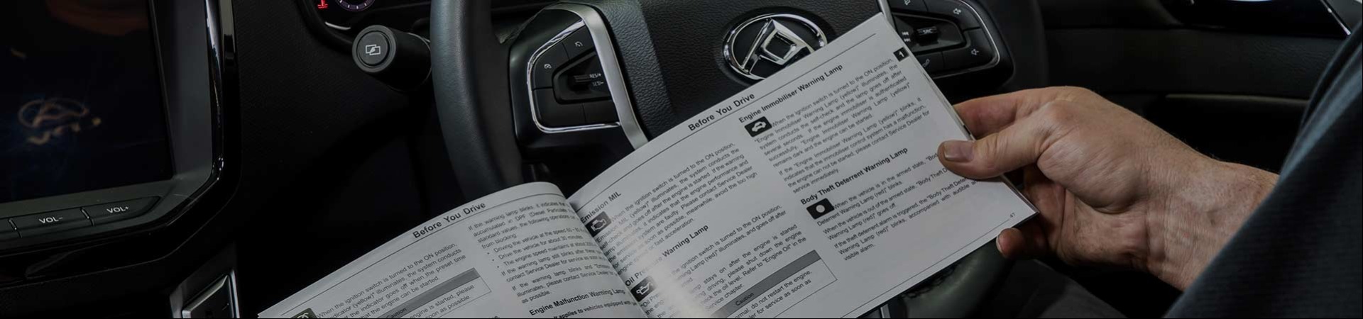 LDV service technician checking owners manual