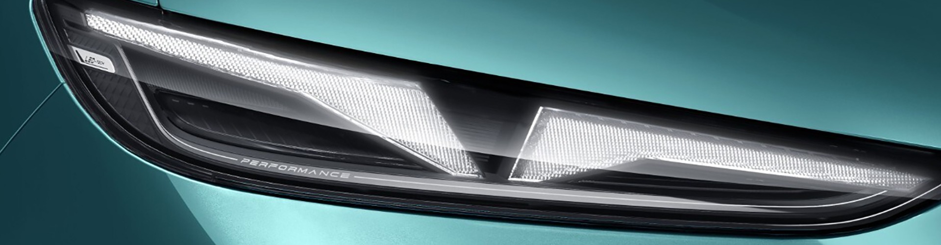 Green Lepas L8 close up of a headlight