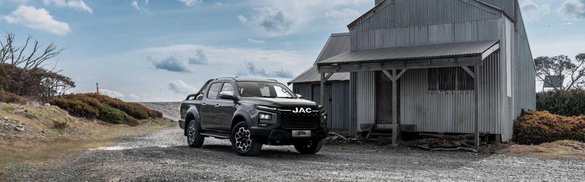 JAC T9 outside of a shed