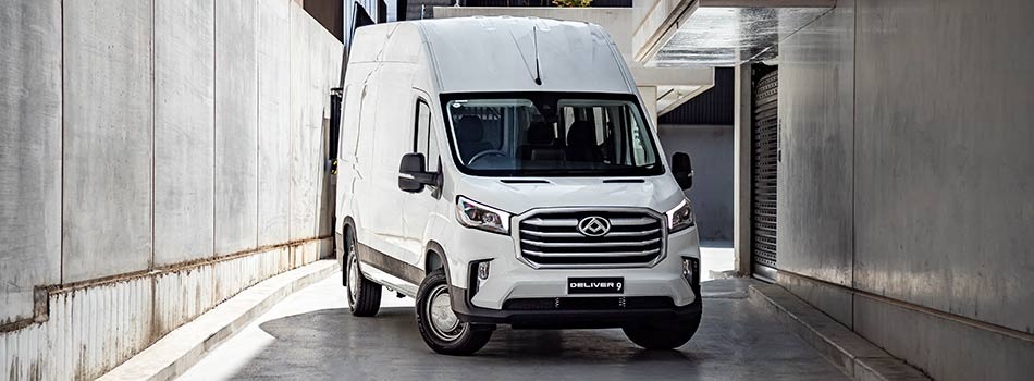 A white LDV Deliver 9 van parked in an underground carpark