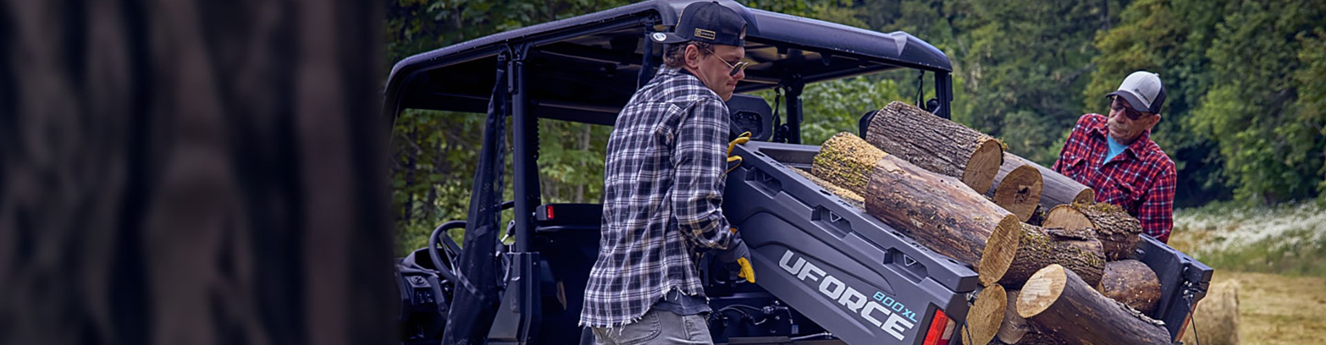 Unloading wood from a CFMoto UForce 800XL