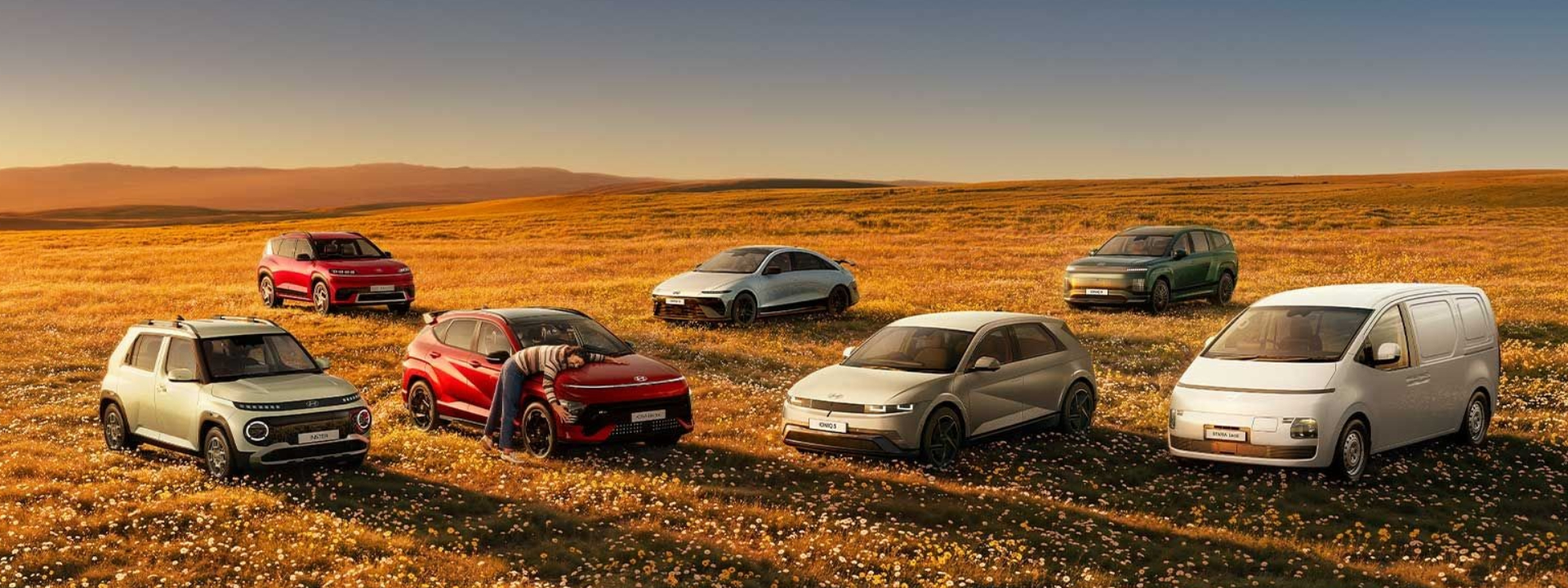 Hyundai electric vehicle range parked in a field