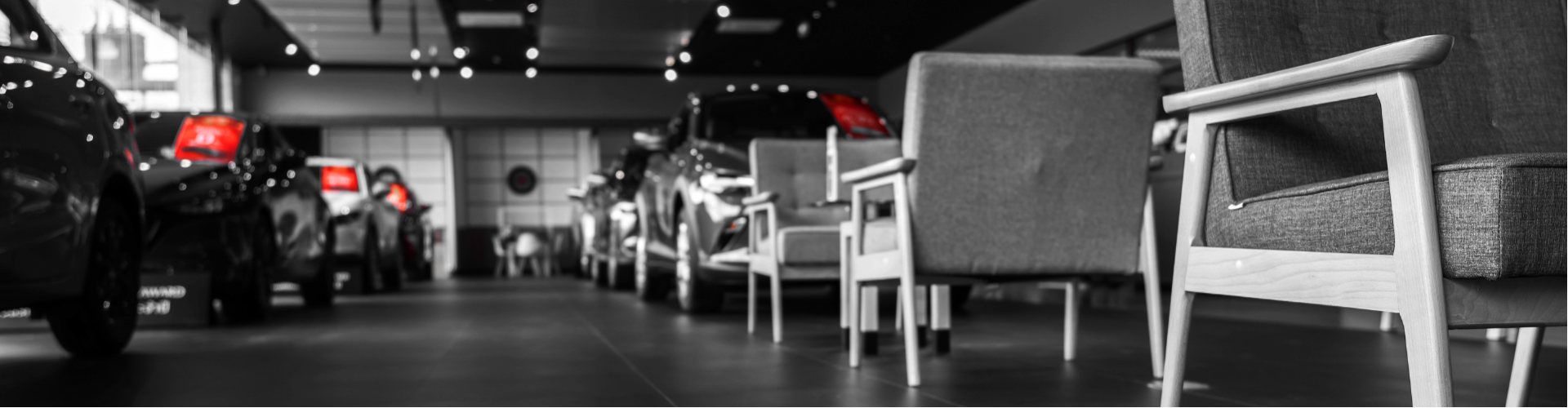 Vehicles and Desk on a Showroom floor