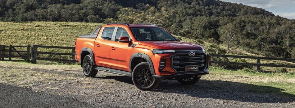 A orange LDV T60 MAX Ute parked in the country