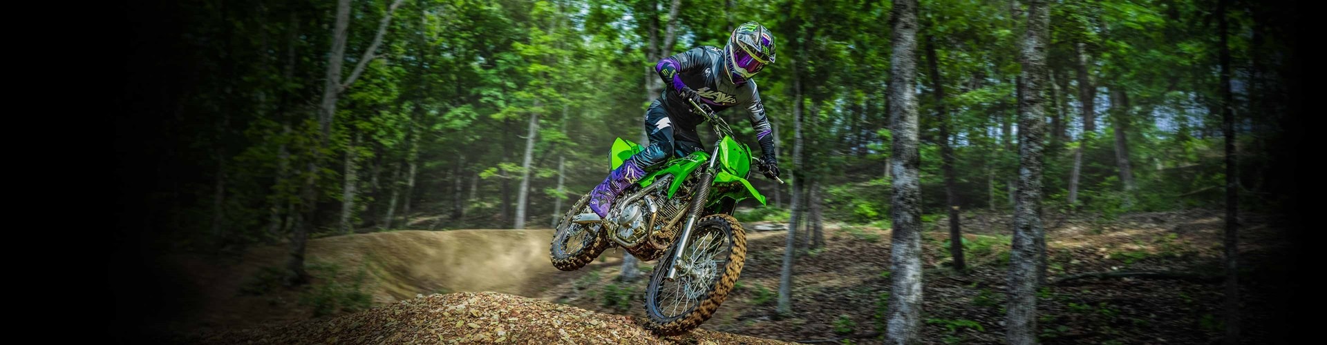 Kawasaki KLX230R riding on the dirt