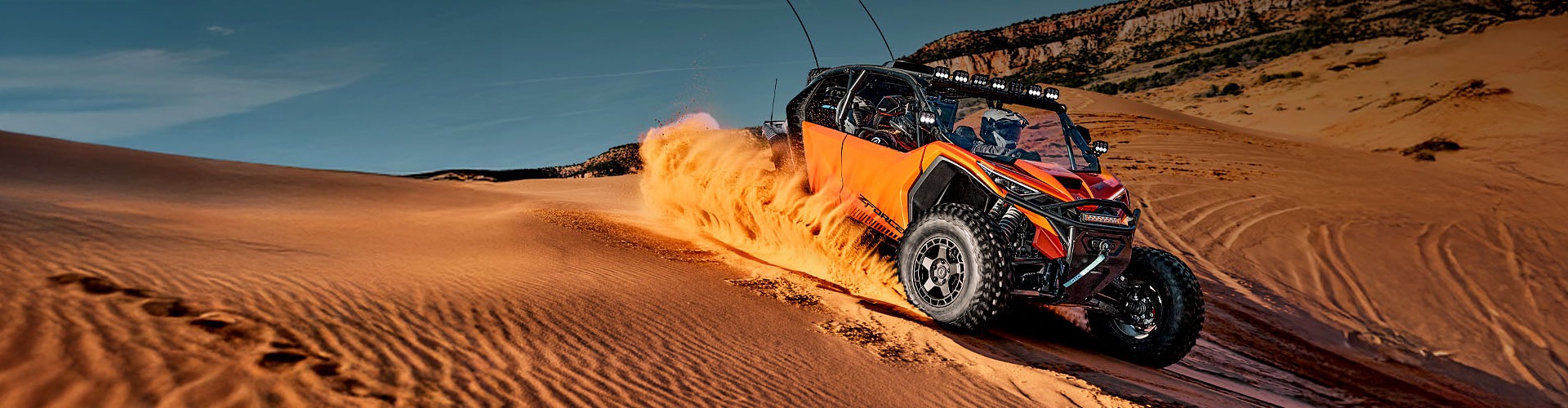 CFMoto ZForce driving in the sands