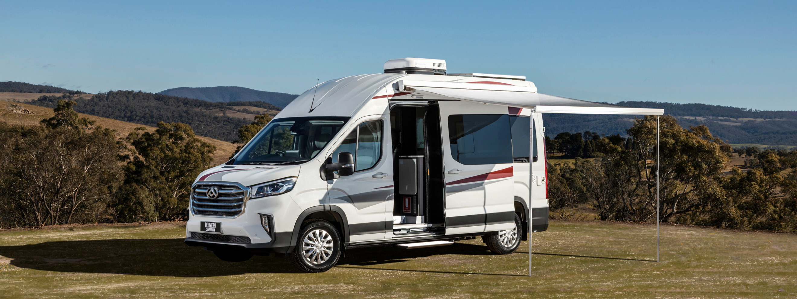 LDV Deliver 9 Campervan in Australia with awning out showing features 