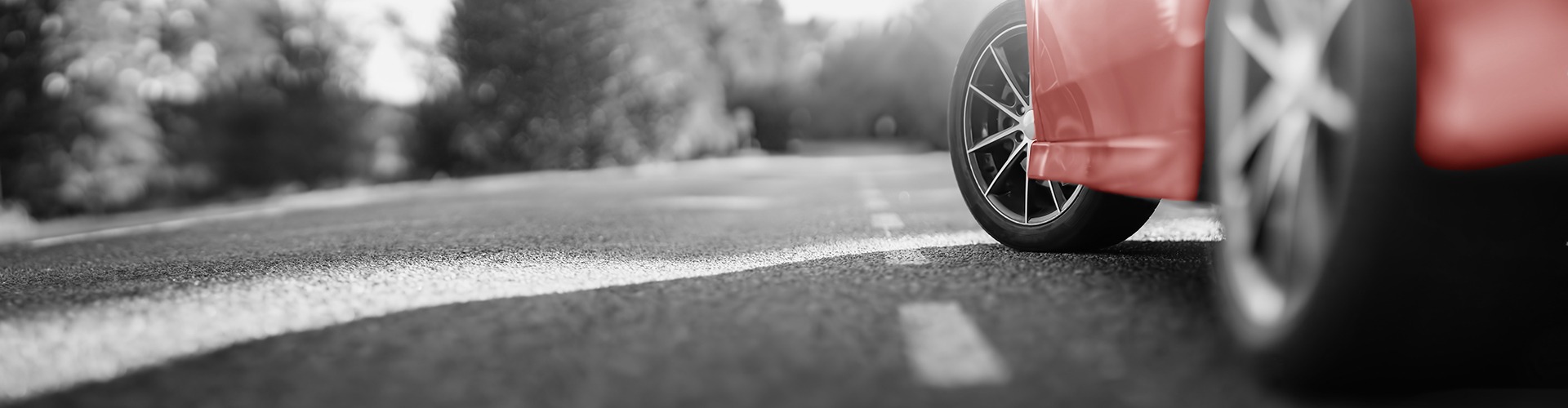 Side of a car showing the wheels